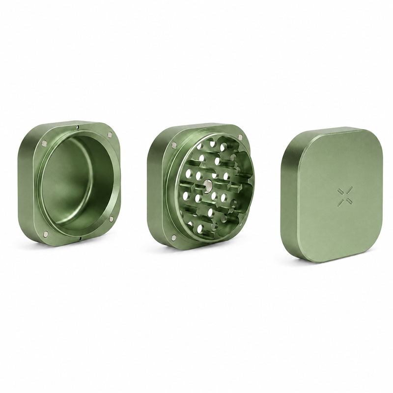 Greenstone PAX Grinder separated into its three sections showing the grinding teeth and storage chamber