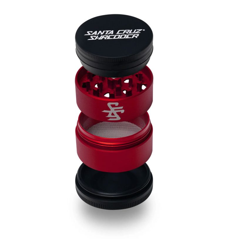 Santa Cruz Shredder Split Series red and black 4 piece herb grinder shown in an exploded open view